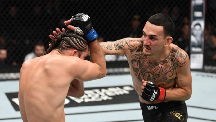 Max Holloway defends the UFC title